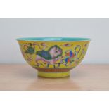 An early 20th century Chinese footed porcelain bowl, depicting mythical creatures with balloons