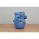 A Studio pottery stoneware triple handled vase, with a blue glaze, by Baron of Barnstaple 12.5cm H