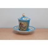 An early 20th century Sevres porcelain hot chocolate cup, cover and saucer, cup and saucer marked to