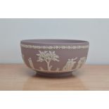 A 20th century Wedgwood jasperware 'sacrifice bowl' white on lilac, impressed marks for '80, with