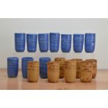 A large collection of Janine Mannion-Jones studio pottery glazed stoneware mugs, comprising ten blue