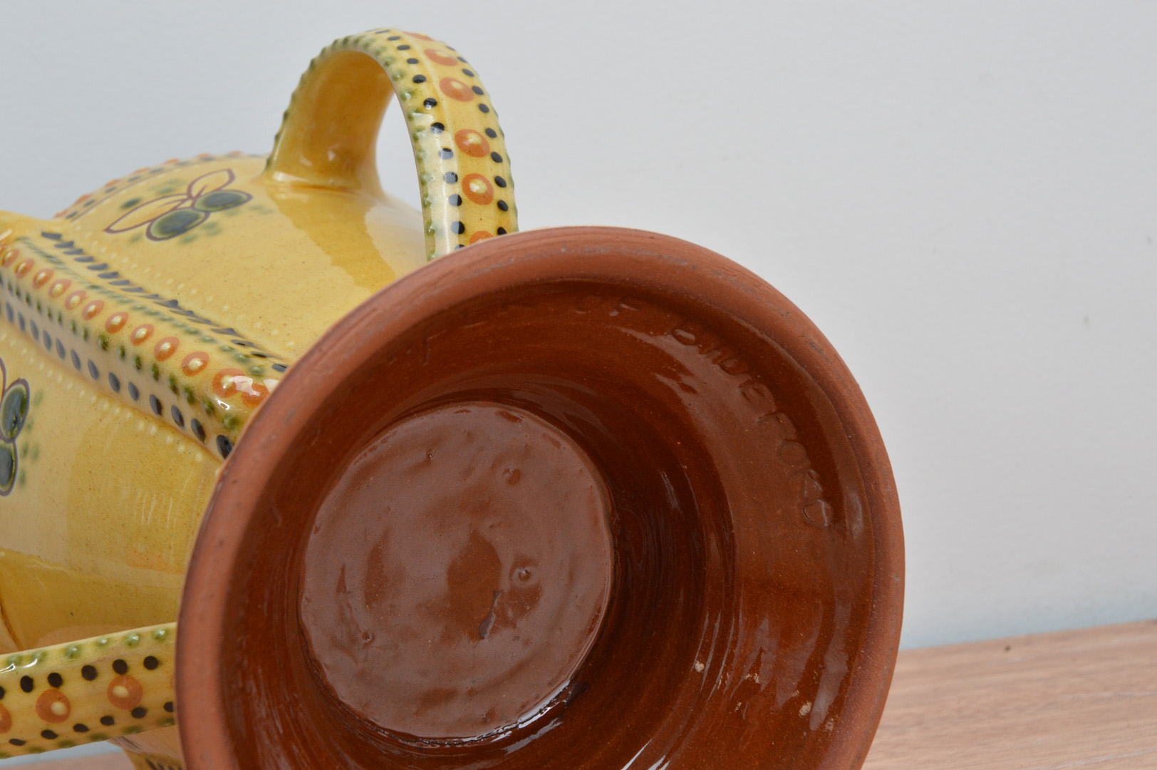 A glazed terracotta covered 'Bideford Possett Pot', by Harry Juniper, dated 1981, pedestal form with - Image 3 of 3