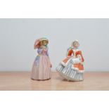 Two Royal Doulton lady figurines, comprising an early Miss Demure H.N. 1402 and Noelle H.N. 2179 (