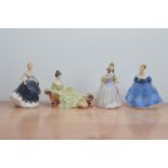 Four Royal Doulton lady figurines, two bisque examples Nina H.N. 2347 and Lisa H.N. 2310 from the