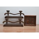 A pair of carved eastern European wooden candle holders, both 38.5cm W, together with a wooden