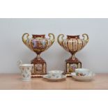 A pair of continental ceramic twin handled vases, both 24cm high, together with a continental tea