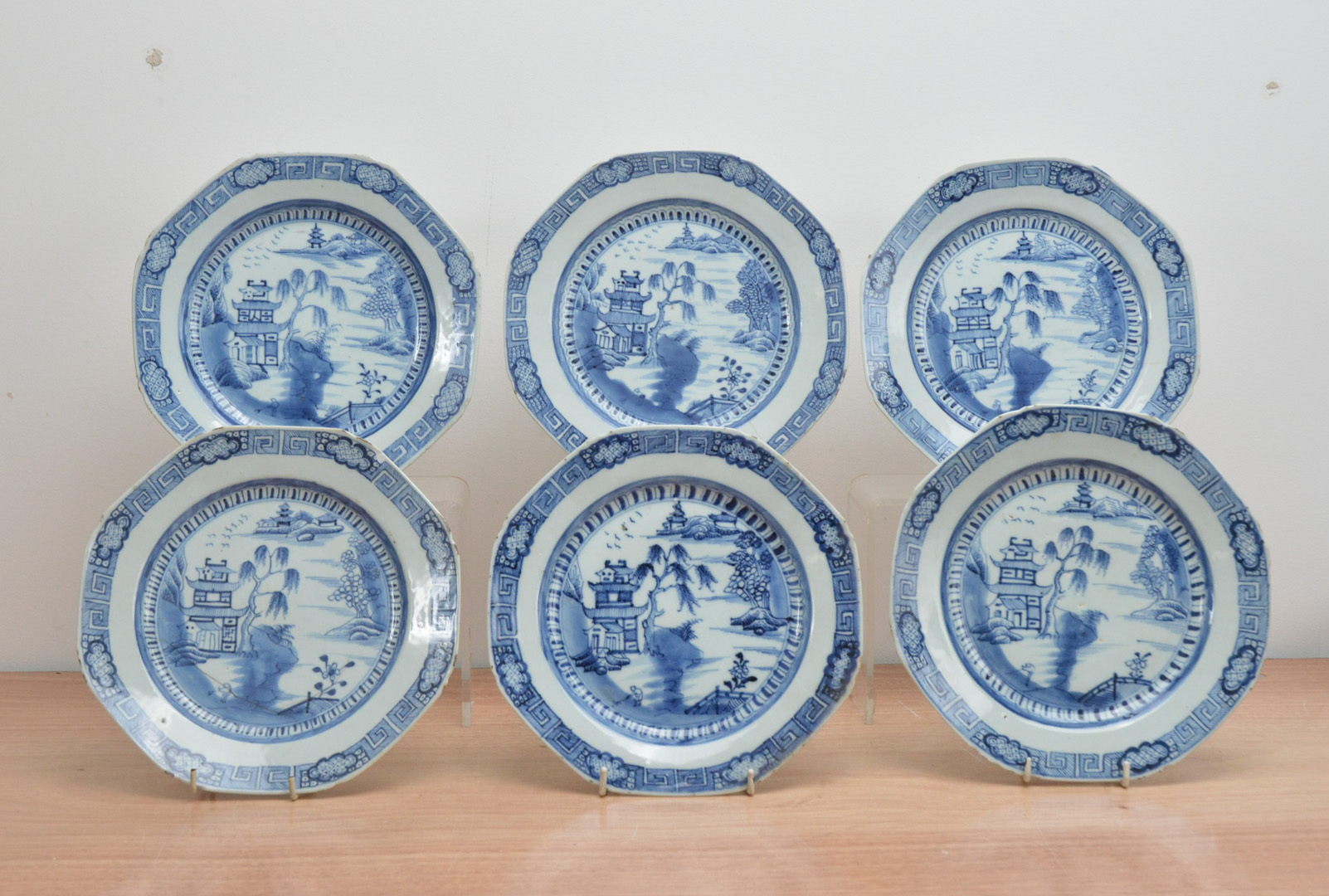 Six early 19th century Chinese porcelain octagonal blue and white plates, with a Willow pattern