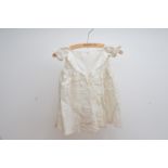 Three late 19th/early 20th century Christening gowns and a hood, all of differing sizes and