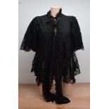 Two 19th century black ladies black jackets, with lace one by Clement Barker, another with a cream