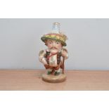 A Royal Crown Derby Dwarf, marked to the underside 18cm high, in a retail box