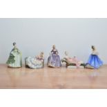 Five Royal Doulton lady figurines, comprising Premiere H.N. 2343, Nicola H.N. 2839, Repose H.N.