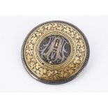 A 19th century monogramed initialled brooch, the circular mixed metal brooch in gold, silver and