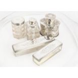 A Victorian silver tea caddy and four cut glass and silver dressing table items