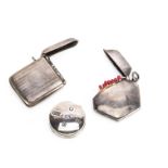 Two early 20th century silver vesta cases and a modern silver pill box, one case hexagonal, the