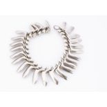 A Georg Jensen silver bracelet, no.115 designed by Bent Gabrielsen circa 1953, this one with later