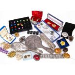 A collection of costume jewellery, including a silver dressing table set, a Joan Rivers box set