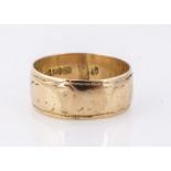 An 18ct yellow gold wedding band, of flattened form, ring size O, 7.5mm, dated Chester 1914 signs of
