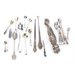 A small group of Victorian and later spoons and other items, including a pair of continental
