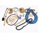 A collection of costume jewels, including simulated pearls, various ladies watches, brooches, a pair