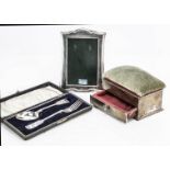An Edwardian silver casket and two other items, including a box with padded upper and drawer by