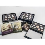 Eight Royal Mint UK proof sets, dated from 1996 to 2003, together with a Trafalgar crown, and two