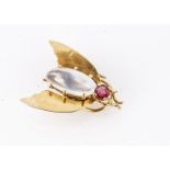 A George VI 9ctl gold red spinel and moonstone bug brooch, oval claw set moonstone cabochon abdomen,