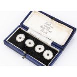 A pair of 9ct gold enamel and paste set circular cufflinks, of circular design, centred with blue