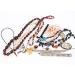 A collection of costume jewels, including a 14ct gold fountain pen, amber and silver oval brooch