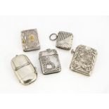 Five silver plated vesta cases, including one with Masonic emblem, another with sovereign and
