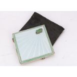 An Art Deco silver and green enamel compact by Adie Bros, 7.3cm square, some light scratches, having