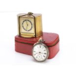 A Victorian silver open faced pocket watch, together with an Europa folding travel alarm clock (2)