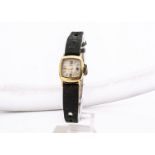 A c1960s Sabra 14ct gold cased lady's wristwatch, 15mm, manual wind on black leather strap