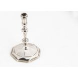 A Queen Anne cast silver small candlestick by Gabriel Sleuth, 11cm high, 3.67 ozt, octagonal base