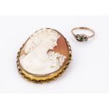A shell cameo oval brooch, profile of a women, with crimped rim, 5 cm by 4.2 cm, together with a 9ct
