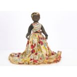 A 1920s Brazilian Bahia cloth doll, with stitched eyes, eyebrows, nostrils and mouth, raised nose,