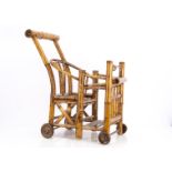 A Chinese bamboo pushchair, and barrel chair on wheels --25in. (65cm.) long