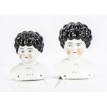 Two Pet Name china shoulder heads, both black haired, the larger Bertha --7in. (18cm.) high; and