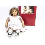 An Annette Himstedt Neblina artist doll, vinyl girl doll with hair wig, in original box with