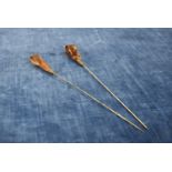 A pair of tortoisesell and silver hat pins with steel pins IMPORTANT! REGARDING CONDITION REPORTS: