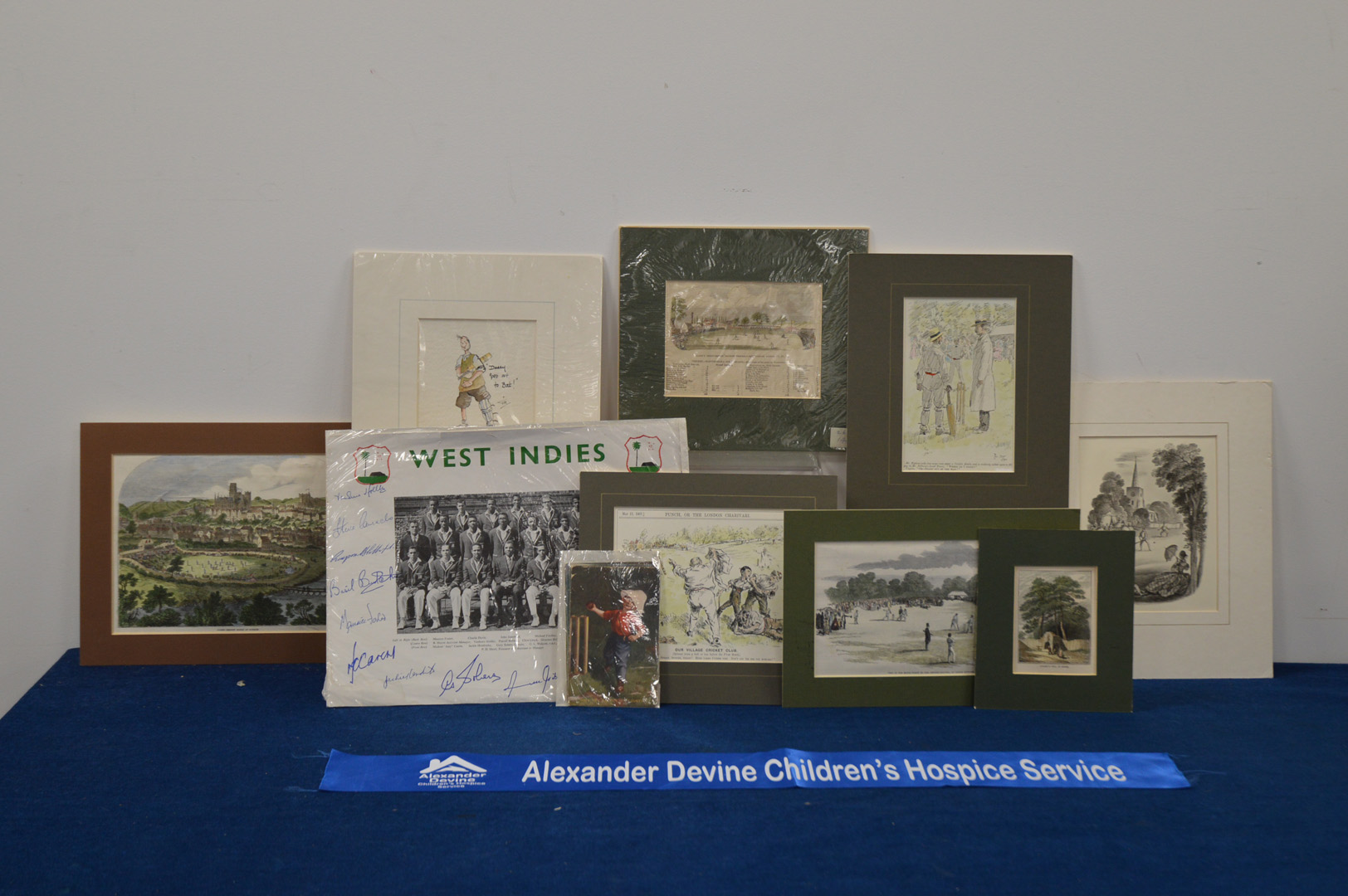 Ten mounted cricket prints and lithographs, including the West Indies team, size 27cm x 37cm