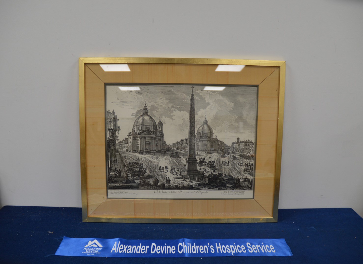 Two framed and glazed prints of Italian Piazza's, classical scenes, the largest 64cm x 87cm