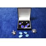 A pair of silver and enamel oval blue cufflinks, marked silver to reverse together with a pair of