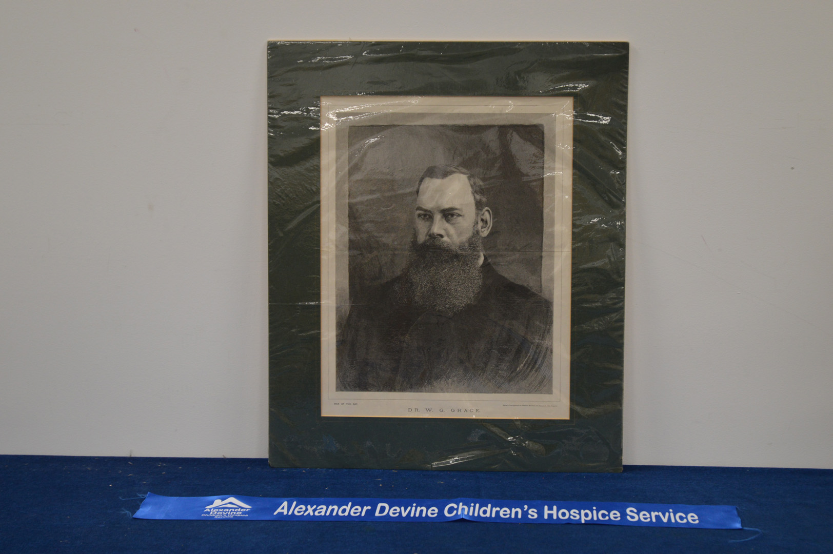 A print portrait of Dr. W. G. Grace, in a mount, 59cm x 49cm IMPORTANT! REGARDING CONDITION REPORTS: