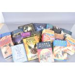 A collection of Harry Potter related books with a misprinted edition of The Half Blood Prince, to