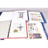 A large collection of Modern British Stamp sets and FDCs, including a quantity of silver and