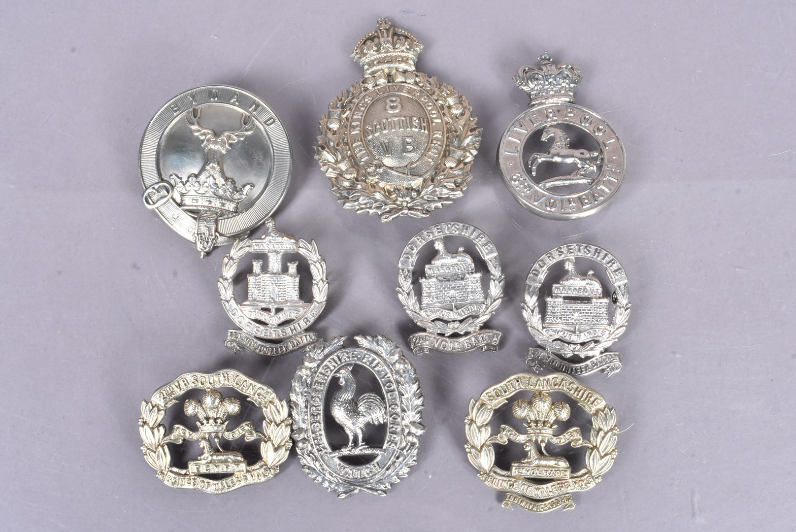 Volunteer Battalions, nine badges, comprising The Kings Liverpool Regiment 6th and 8th Volunteer