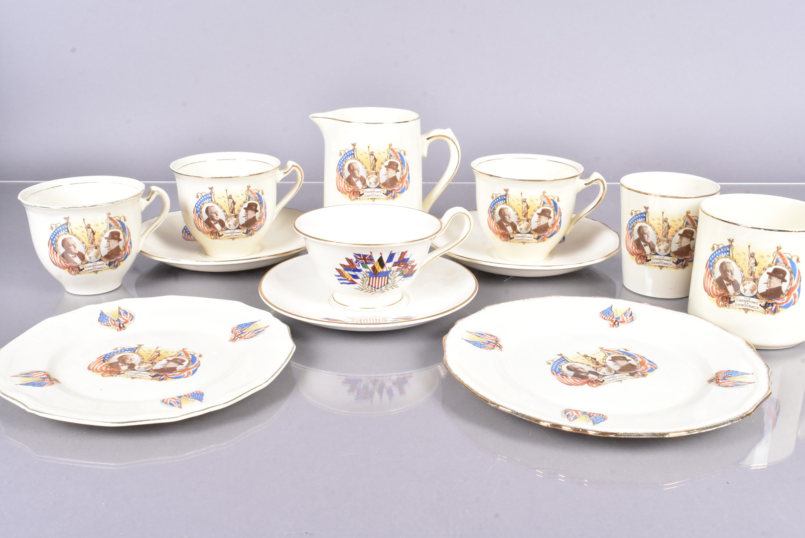 A WWI period Wedgwood Allied Flags teacup and saucer, together with a selection of WWII Alfred