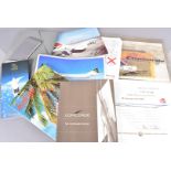 An assortment of Concorde ephemera, to include Flight Certificates, note pads and pencils, a sick