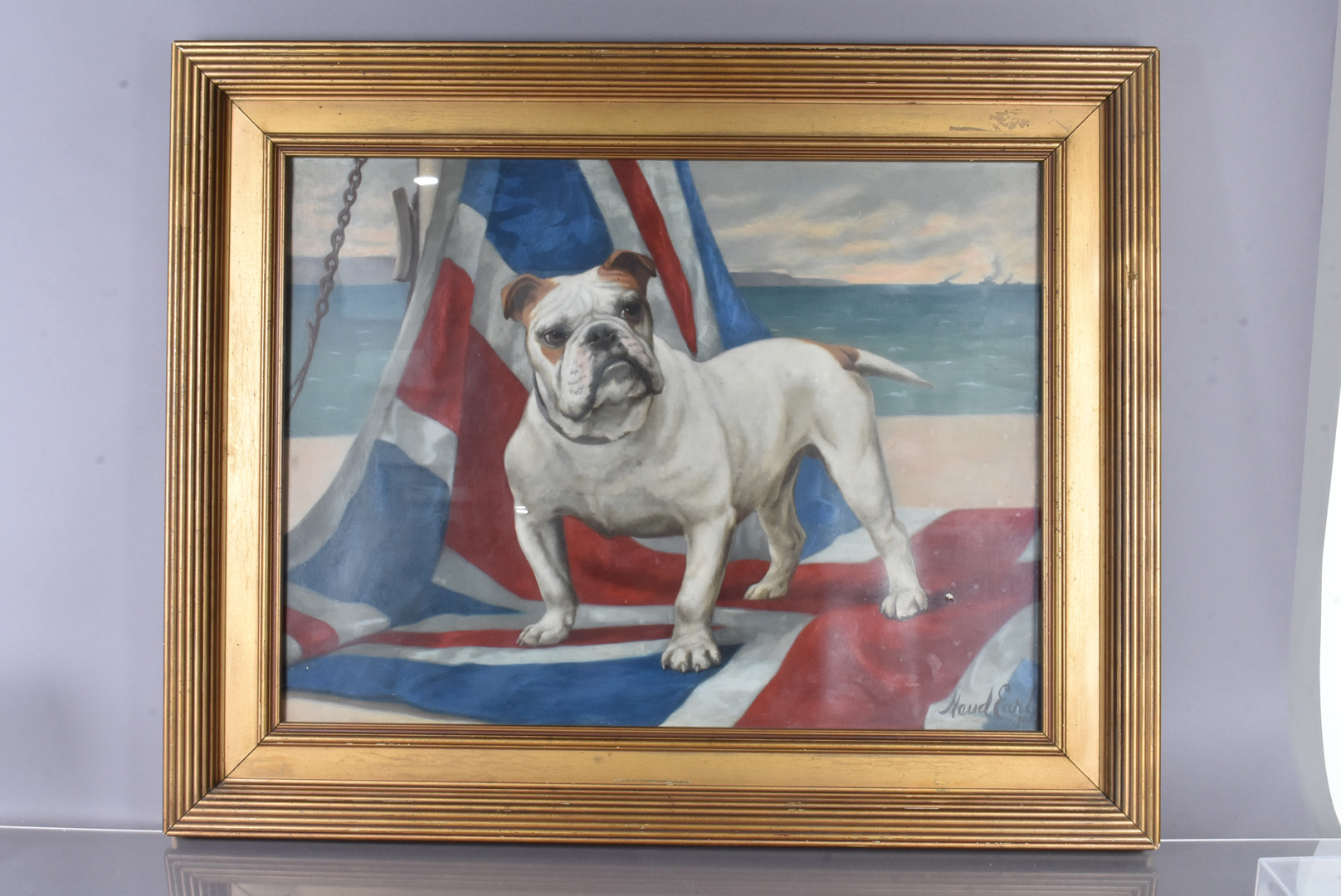 In the manner of Maud Earl, oil on cardboard, depicting a Bulldog standing on the Union Jack flag,