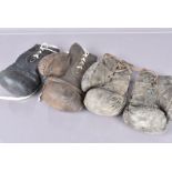 Boxing Gloves, four boxing gloves from a different era, a pair and two odd, three made by